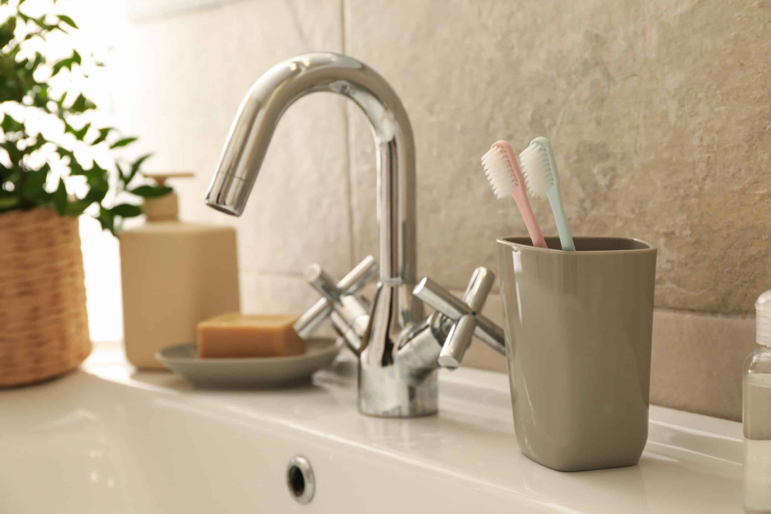 Sink and personal hygiene accessories in bathroom